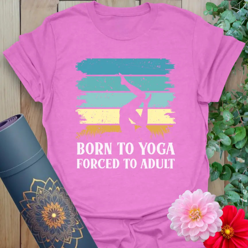 Designed by Ramro Yoga Wear our flatlay of heather radiant orchid Adult T-Shirt with colorful “Born to Yoga, Forced to Adult” design, spiritual and funny.