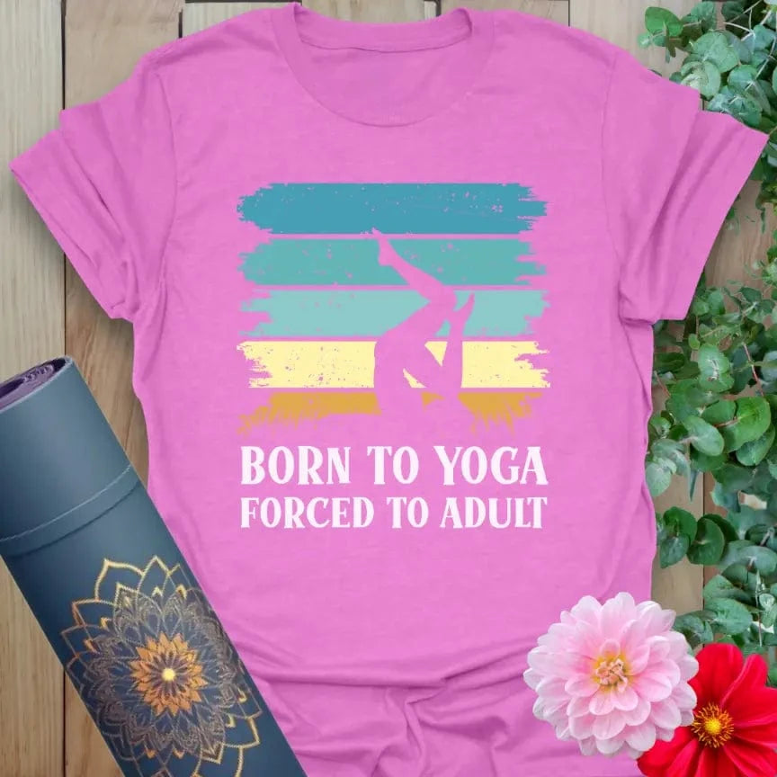 Designed by Ramro Yoga Wear our flatlay of heather radiant orchid Adult T-Shirt with colorful “Born to Yoga, Forced to Adult” design, spiritual and funny.