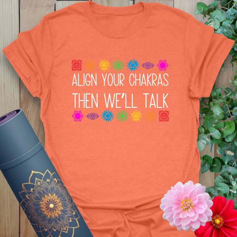 Align Your Chakras T-Shirt in Heather Orange featuring colorful chakra graphic and spiritual quote.
