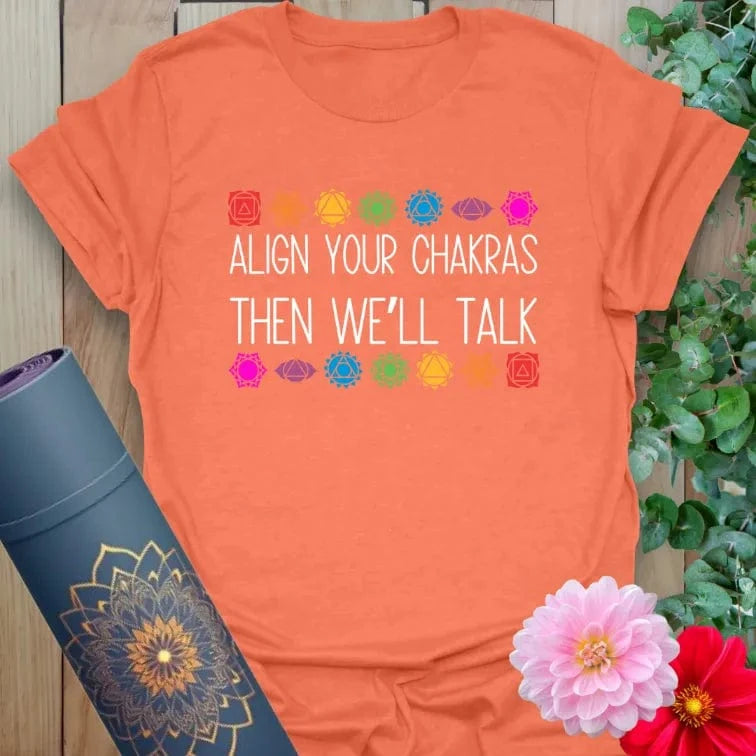Align Your Chakras T-Shirt in Heather Orange featuring colorful chakra graphic and spiritual quote.