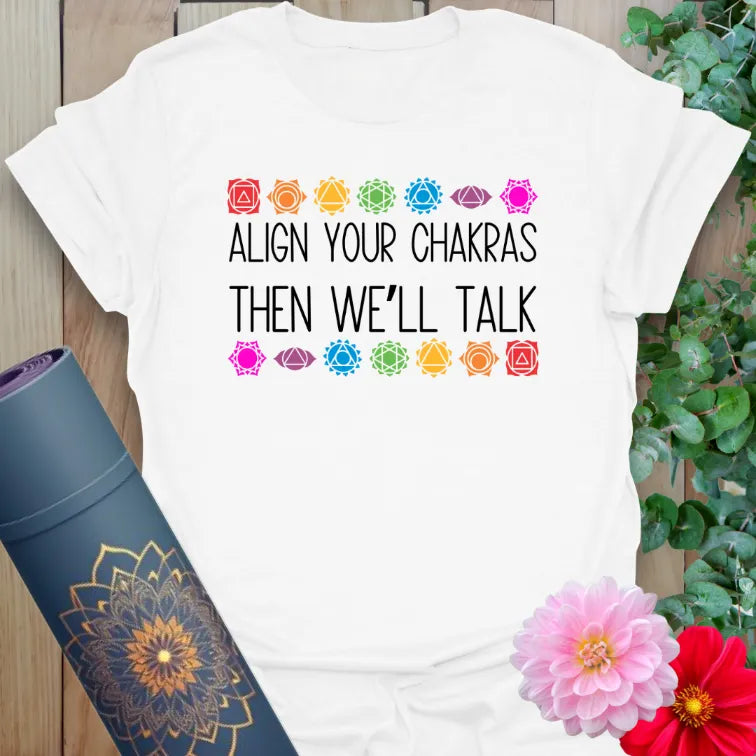 Align Your Chakras T-Shirt in White with energy healing symbols and “Align Your Chakras” message, crafted by Ramro.