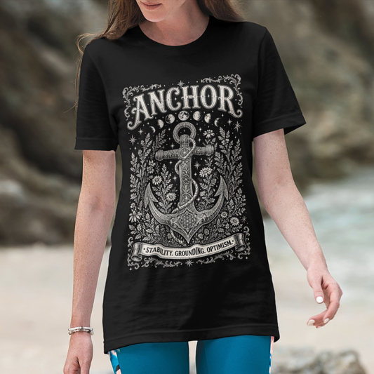 Woman wearing Anchor black meditation shirt at beach — Dark Sacred Stillness collection by Ramro Yoga Wear