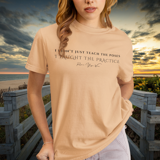 Woman wearing Ancient Heather Peach yoga teacher gift tee at a beach boardwalk during sunset — Yoga Teacher Gifts collection by Ramro Yoga Wear