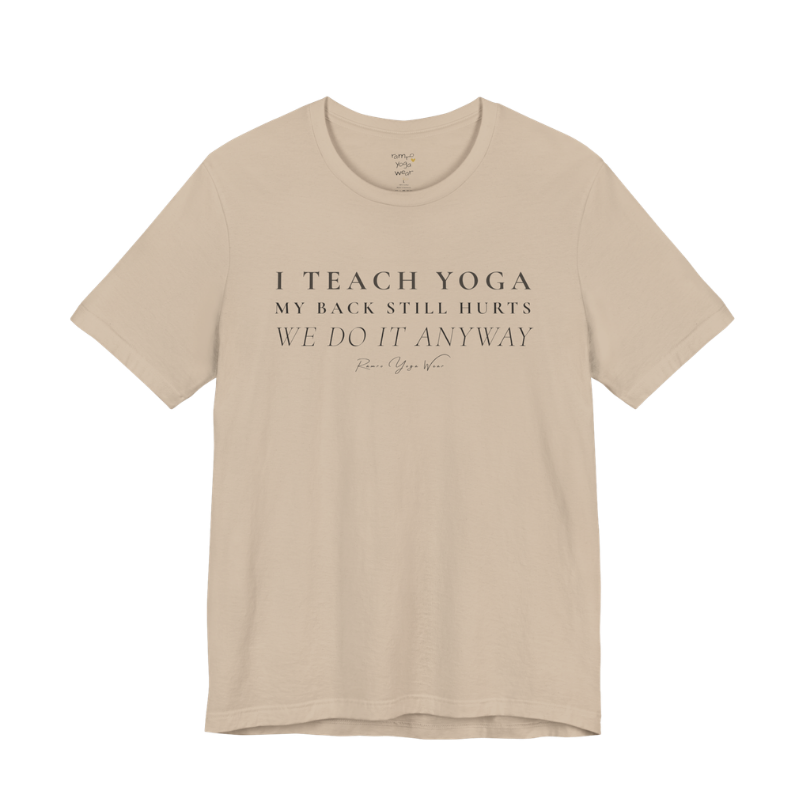 I TEACH YOGA MY BACK STILL HURTS WE DO IT ANYWAY yoga teacher gift tee flat lay in Tan — Yoga Teacher Gifts collection by Ramro Yoga Wear