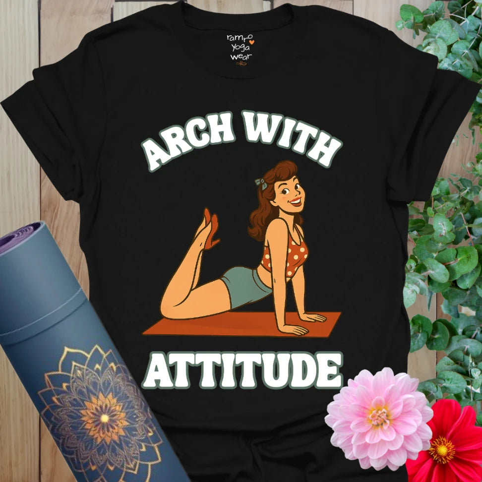 Bold black yoga t-shirt with retro pinup girl in Upward-Facing Dog and “Arch With Attitude” quote for vintage-inspired movement.