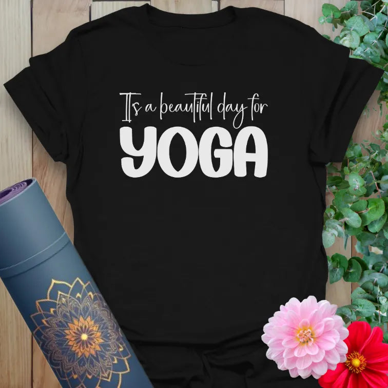 Black yoga t-shirt with white “It’s a beautiful day for yoga” motivational quote