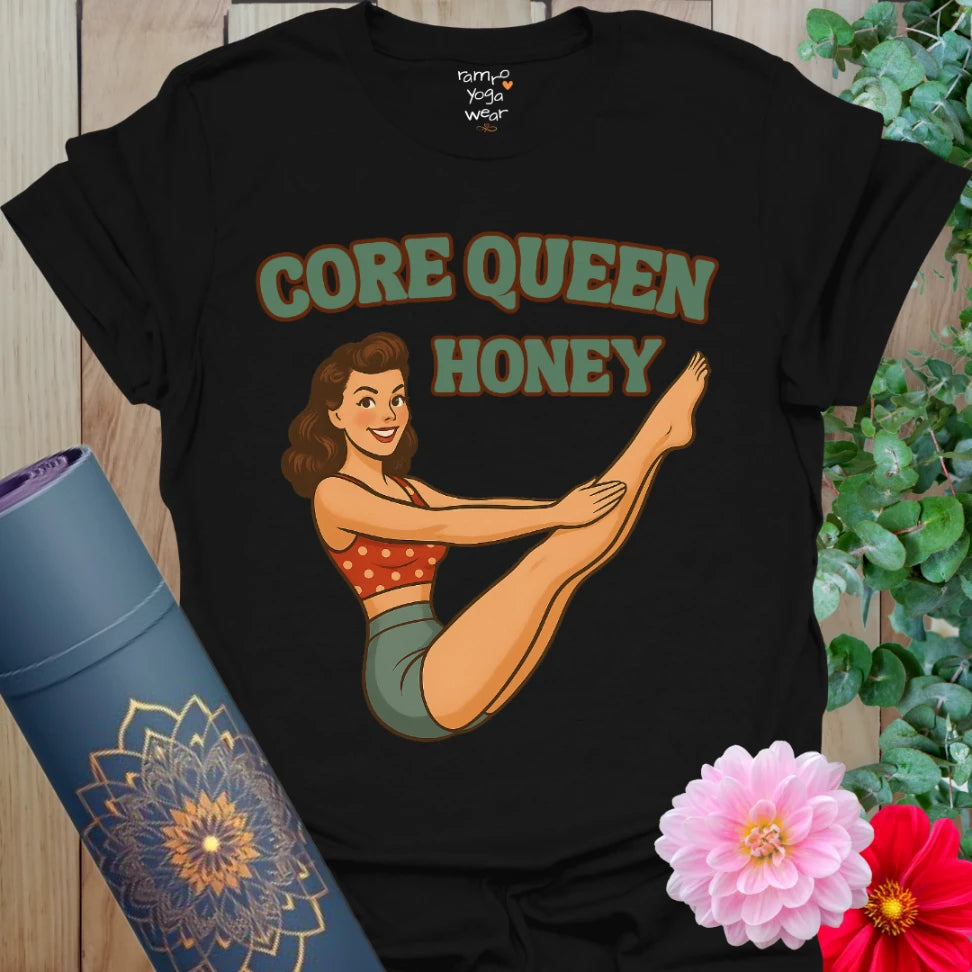 Bold black yoga t-shirt with vintage pinup girl in Boat Pose, celebrating core strength and playful retro flair.