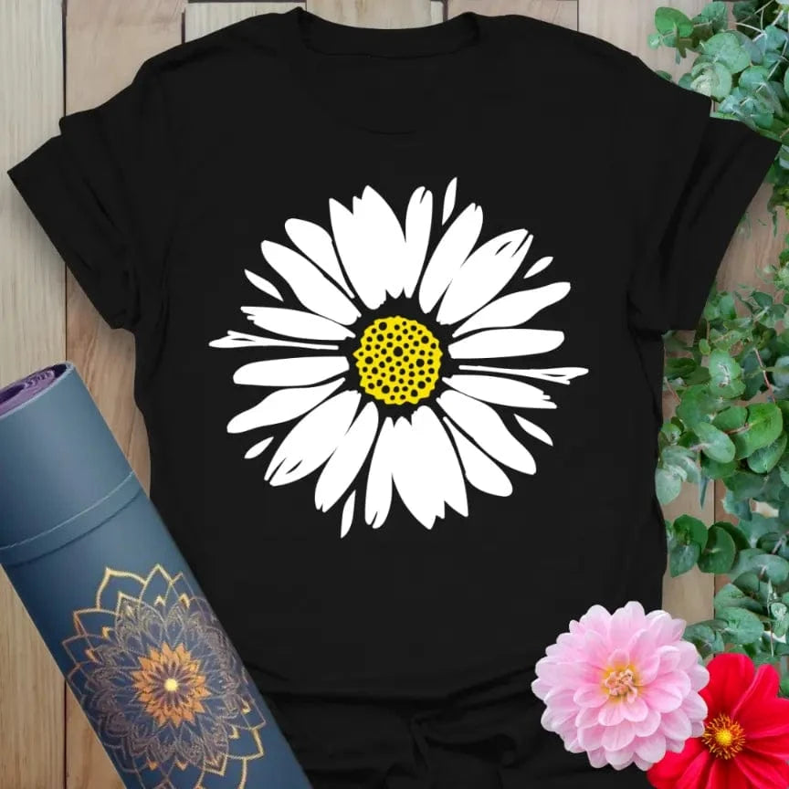 Black yoga t-shirt with blush pink daisy and bright yellow center graphic