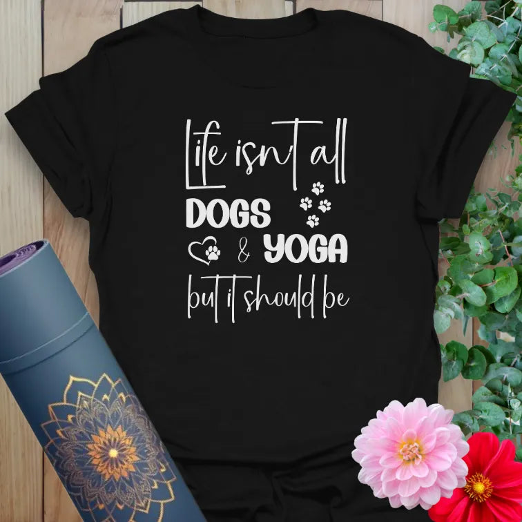 Black yoga t-shirt with playful "Life isn't all dogs and yoga" quote and paw prints