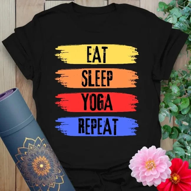 Black yoga t-shirt featuring colorful "Eat Sleep Yoga Repeat" brushstroke design