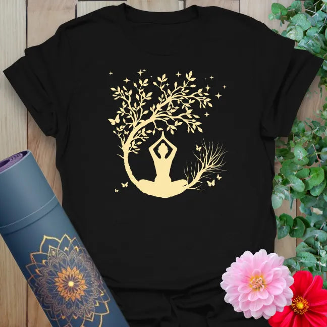 Classic black cotton yoga t-shirt with crescent moon, yogi, and tree design symbolizing evening meditation and inner peace.
