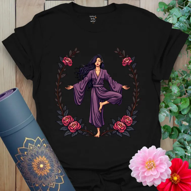 Classic black cotton yoga t-shirt with dynamic yogi and rose wreath artwork symbolizing grace, power, and freedom.