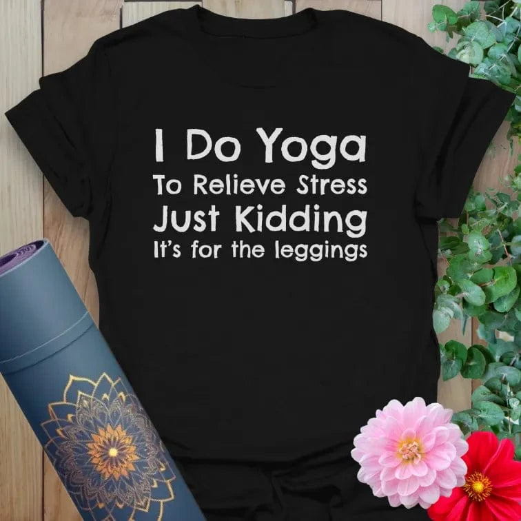 Classic black cotton yoga t-shirt featuring funny "Just Kidding, It's for the Leggings" message for soulful, conscious living.