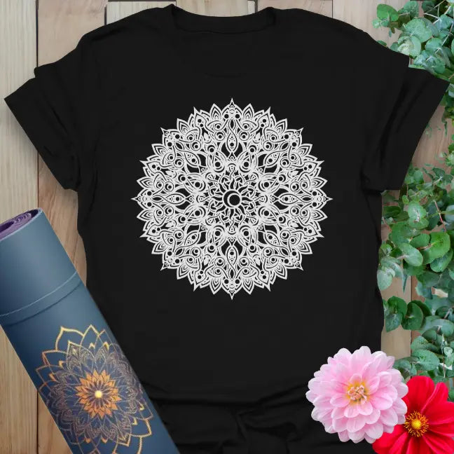 Classic black cotton yoga t-shirt showcasing detailed mandala artwork symbolizing sacred geometry, balance, and conscious flow.