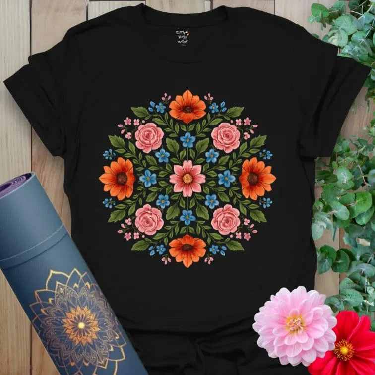 Classic black cotton yoga t-shirt showcasing bright floral mandala for creative, conscious, soul-centered living.