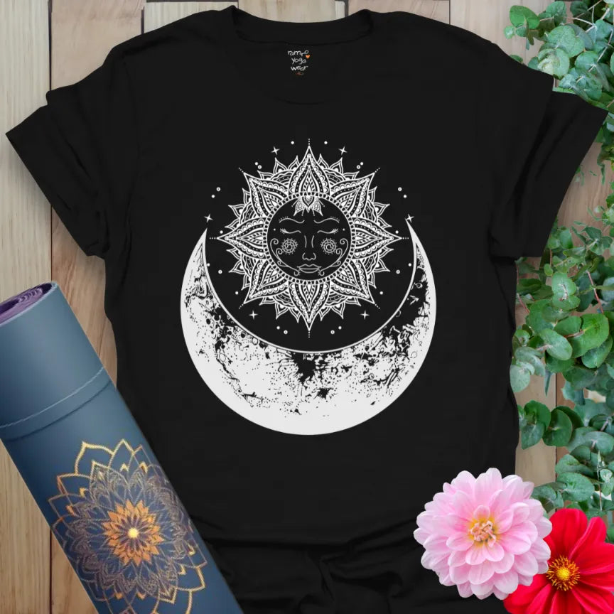 Classic black cotton yoga t-shirt showcasing mystical celestial sun and moon illustration for mindful living and soulful self-expression.