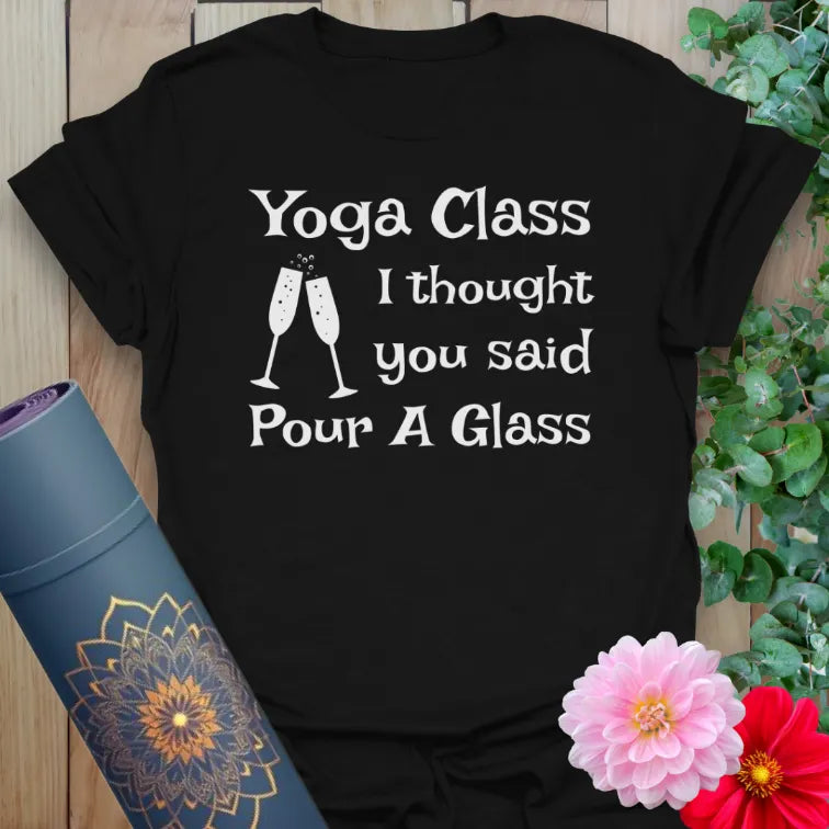 Classic black cotton yoga t-shirt showcasing witty "Pour A Glass" yoga joke design for mindfulness lovers with a sense of humor.