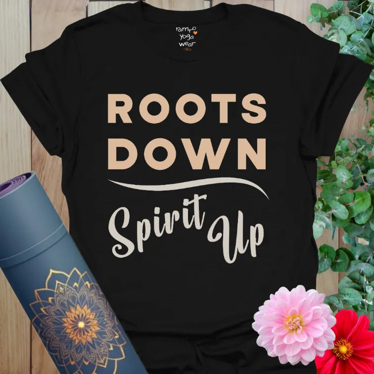 Bold grounded yoga phrase, vintage serif and script combo on classic black tee, mindful flow style.
