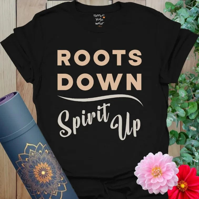 Bold grounded yoga phrase, vintage serif and script combo on classic black tee, mindful flow style.