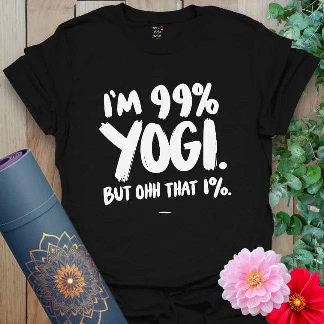 Classic black cotton t-shirt with clean white lettering that reads “I’m 99 Percent Yogi. But ohh that 1 Percent,” great for streetwear and studio.
