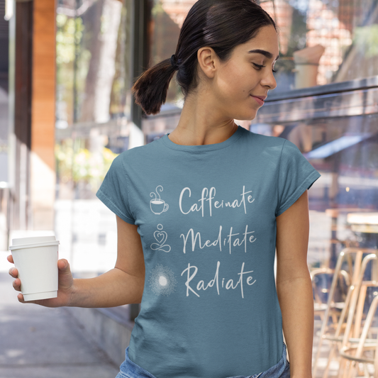 Woman wearing Caffeinate Indigo Blue T-Shirt outdoors on a city street — The Vault collection by Ramro Yoga Wear