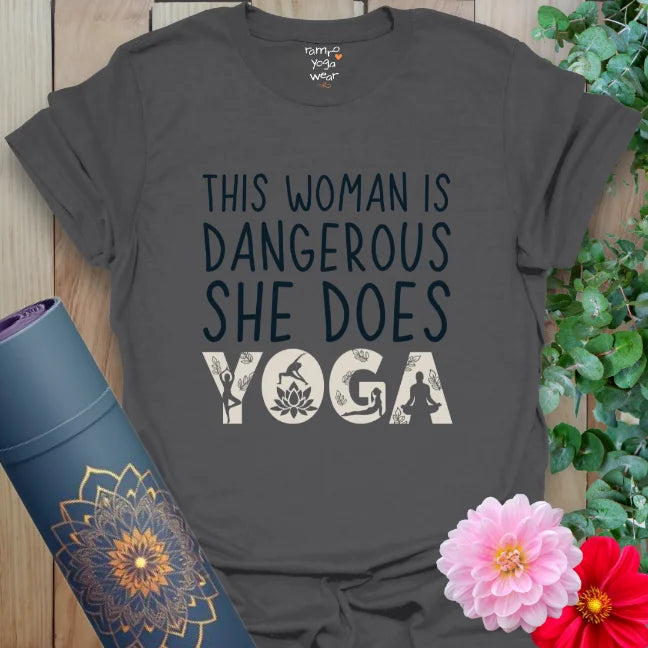 Charcoal gray shirt with dramatic contrast text. “This Woman Is Dangerous. She Does Yoga.” Empowered and grounded style.