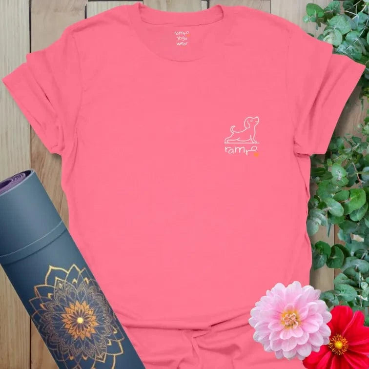 Coral Silk Good Energy T-Shirt featuring peaceful yoga dog line drawing and Ramro logo. Soft and vibrant yoga wear.