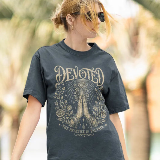 Ramro Yoga Wear Devoted tee in Dark Heather Grey — prayer hands roses light vintage design, outdoor street lifestyle shot