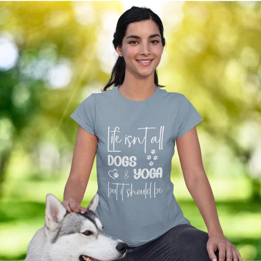 Woman wearing Dog Sage yoga shirt outdoors with her dog — The Vault collection by Ramro Yoga Wear
