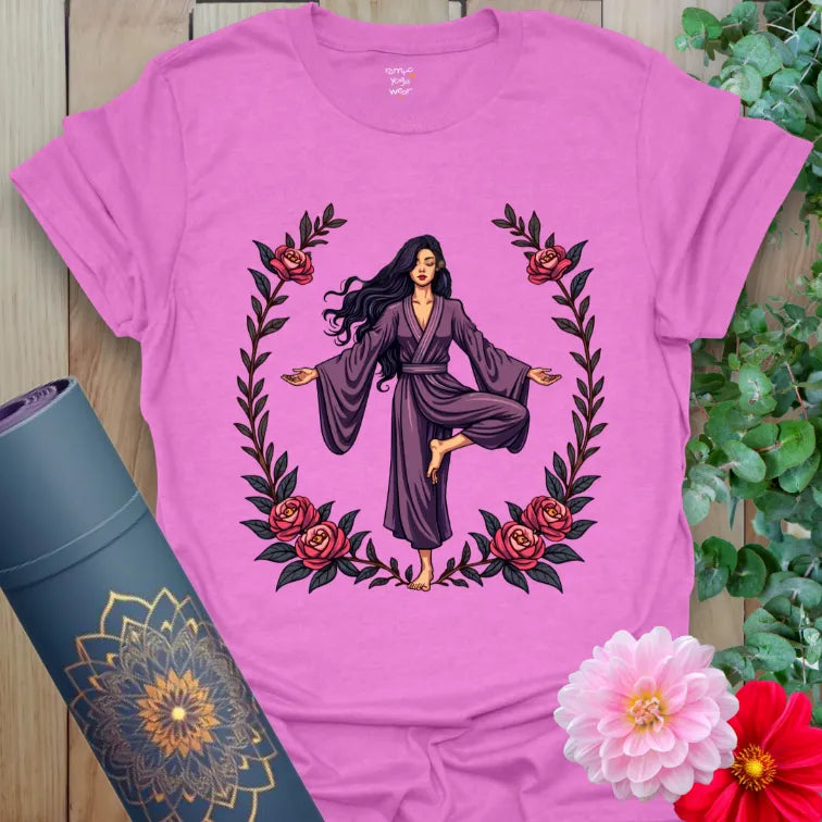 Radiant orchid-colored yoga tee with flowing yogi and blooming rose design celebrating inner strength and feminine spirit.