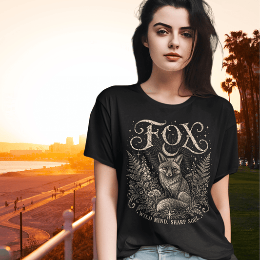 Ramro Yoga Wear Fox tee in Black — wild fox crescent moon botanical vintage design, coastal sunset lifestyle shot