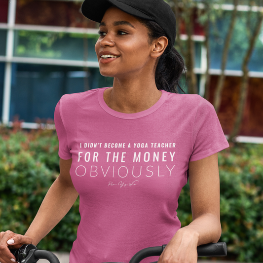 Woman wearing Guide Heather Raspberry yoga teacher gift tee on a bicycle outdoors — Yoga Teacher Gifts collection by Ramro Yoga Wear