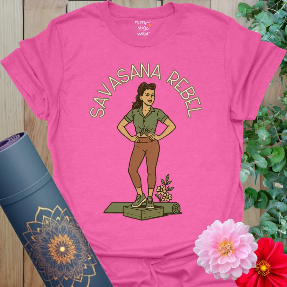 Vibrant pink heather yoga t-shirt featuring confident pinup yogi and floral accent for fun mindful wear.