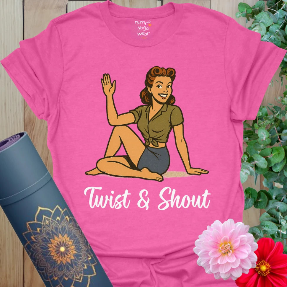 Vibrant pink heather yoga tee with cheeky seated twist yogi and playful âTwist & Shoutâ message.