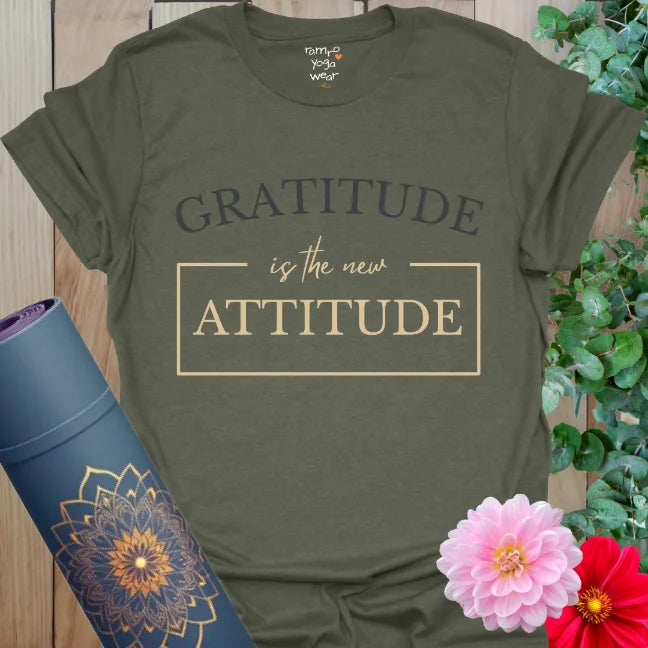 Heather Military Green Attitude T-Shirt with bold “Gratitude is the new Attitude” quote in tan and charcoal. Grounded tones with a soulful message.