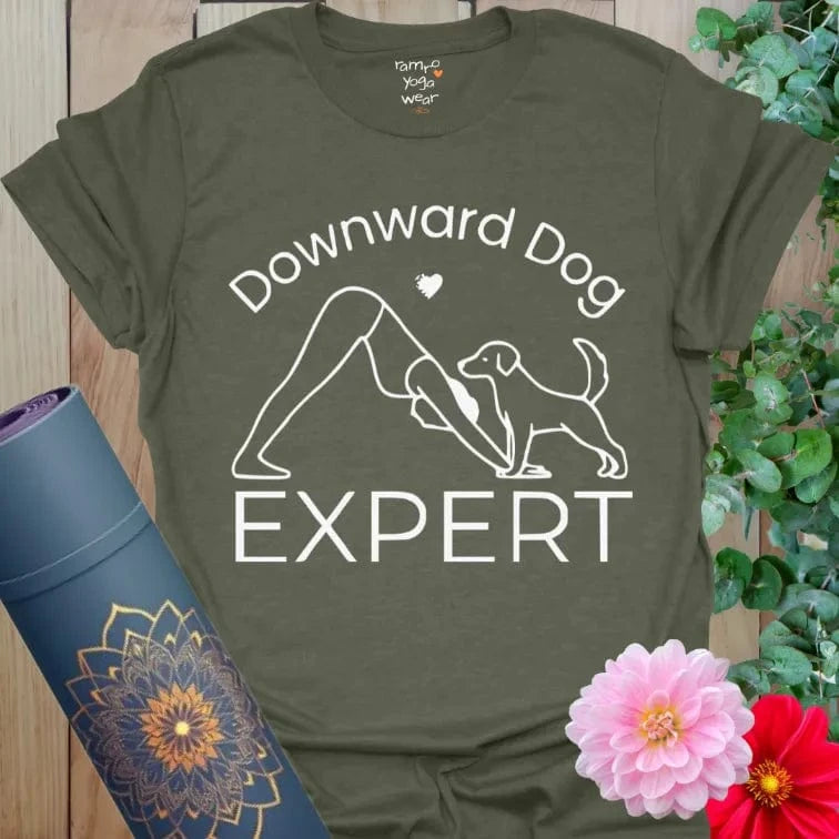 Heather Military Green Dog Expert T-Shirt with playful yoga and dog illustration. Funny yoga shirt for dog lovers.