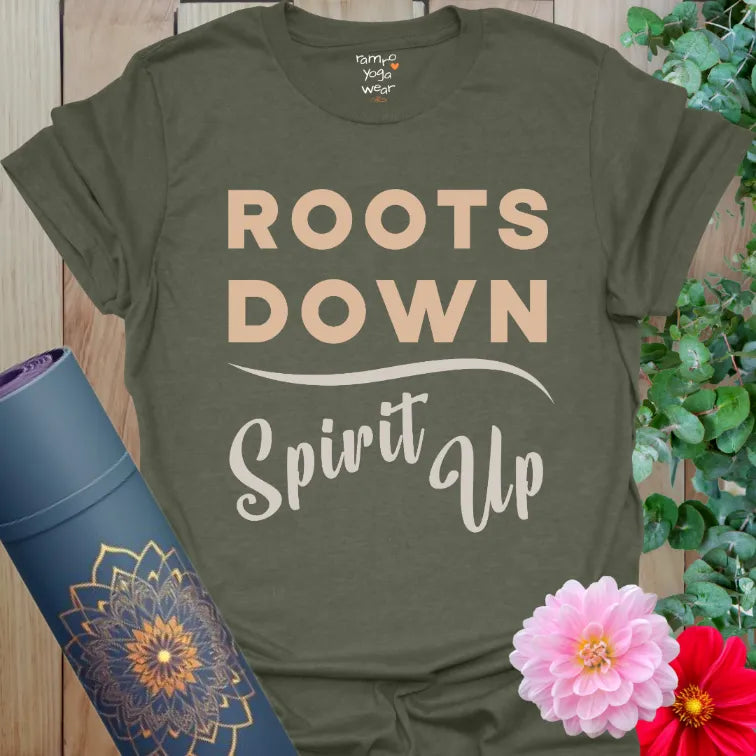 Earthy grounded yoga mantra tee with vintage block text and flowing script on soft olive green shirt.