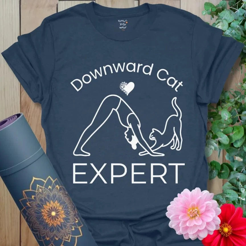 Heather Navy Cat Expert T-Shirt with yoga-inspired cat design, showing a yogi and cat in mirrored poses, text reads "Downward Cat Expert."