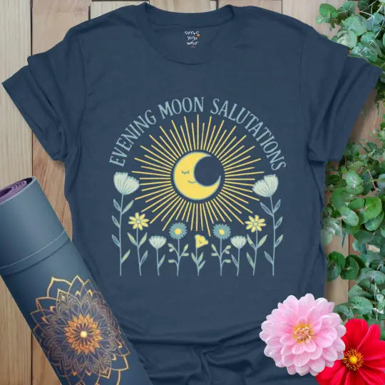 Heather Navy Evening Moon Salutations T-Shirt showcasing soft golden rays and moonlight blooms. Yoga tee celebrating balance and nighttime calm.