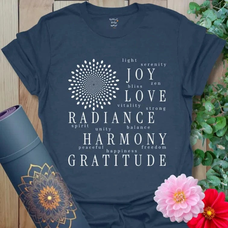 Navy yoga tee with gratitude-inspired word art design and mandala-style sunburst.