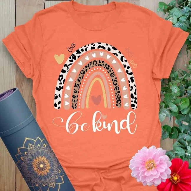 Heather orange t-shirt with warm retro rainbow and uplifting be kind text