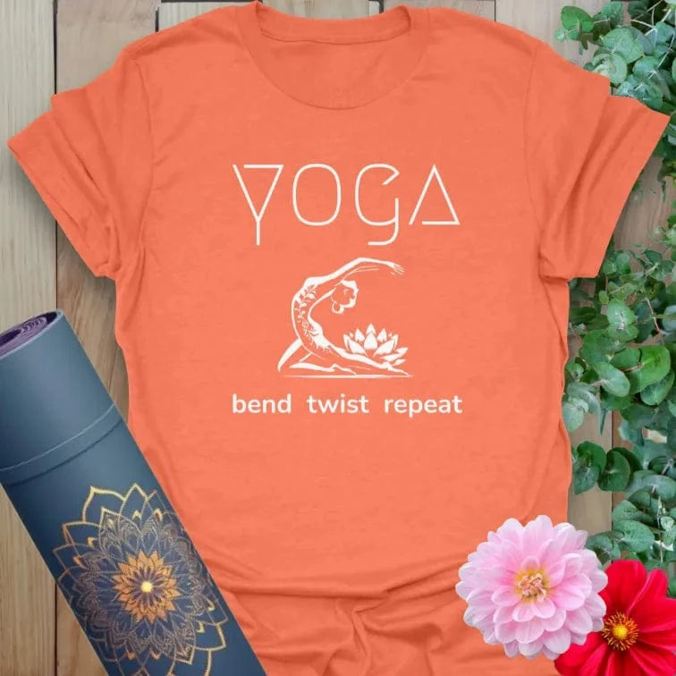 Heather orange yoga tee with curved pose and mindful flow statement