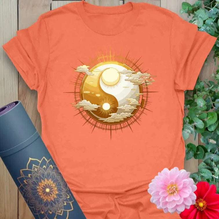 Heather orange Cosmic Harmony T-Shirt with radiant sun, moon, and cosmic balance graphic