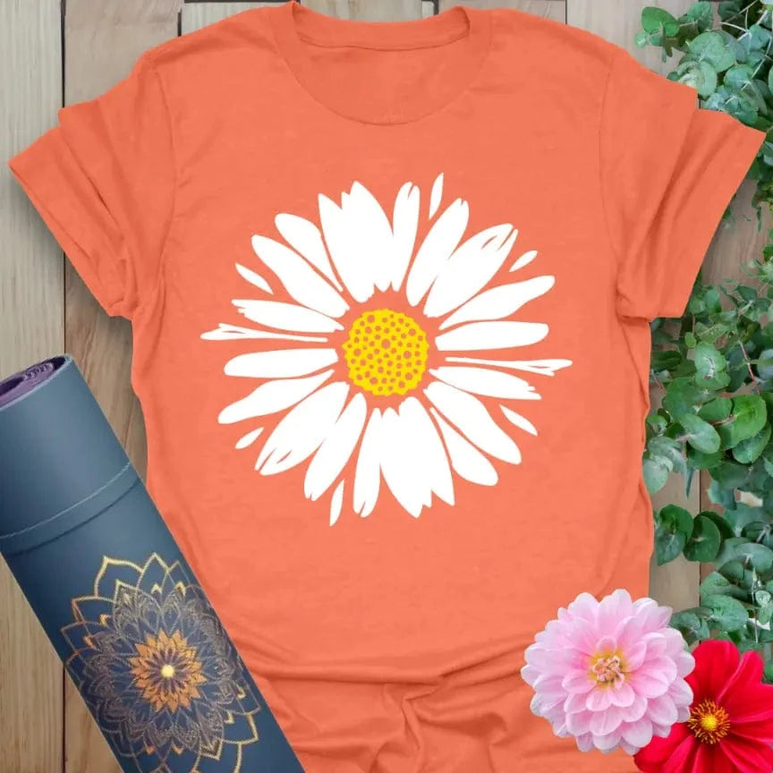 Heather orange t-shirt with vibrant pink daisy and bright summer energy