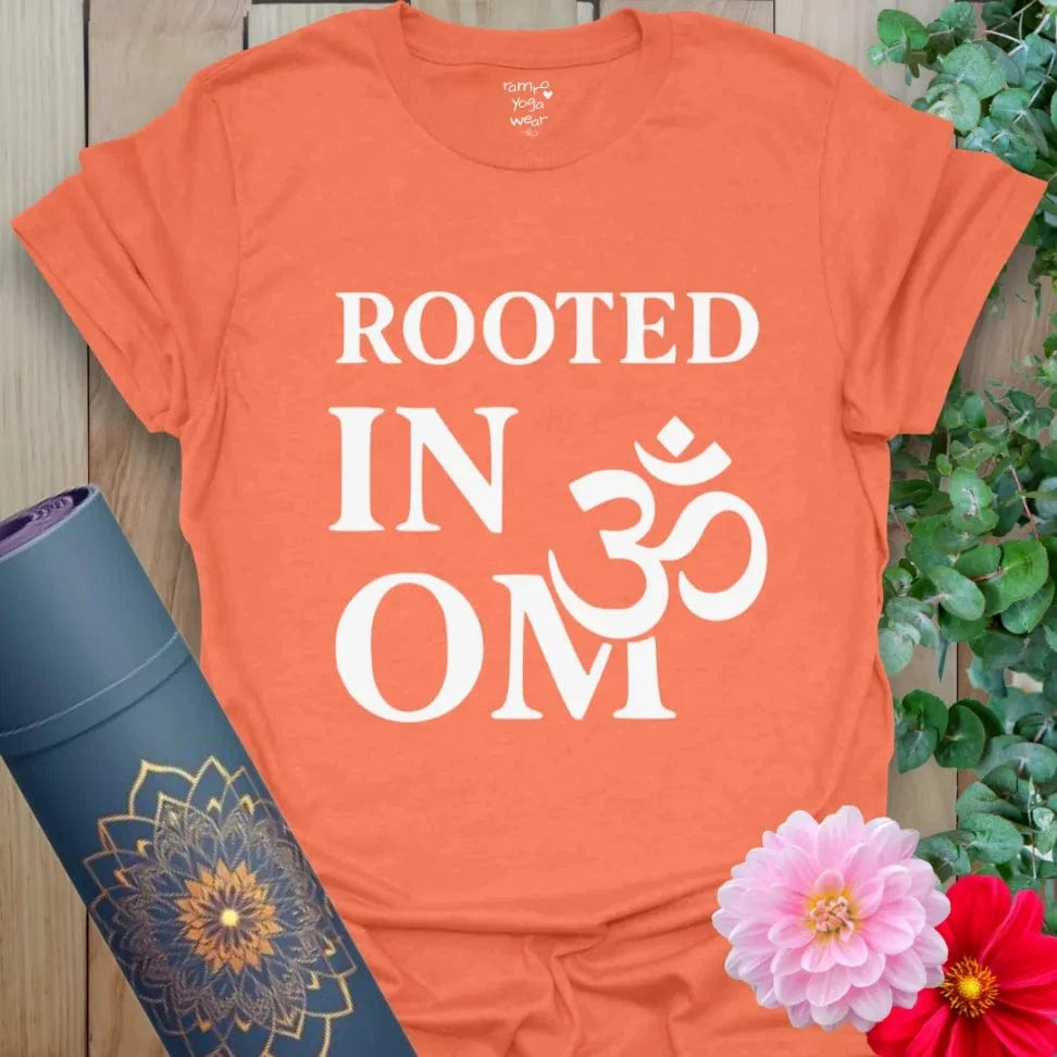 Heather orange yoga shirt with powerful "Rooted in OM" design for soulful expression
