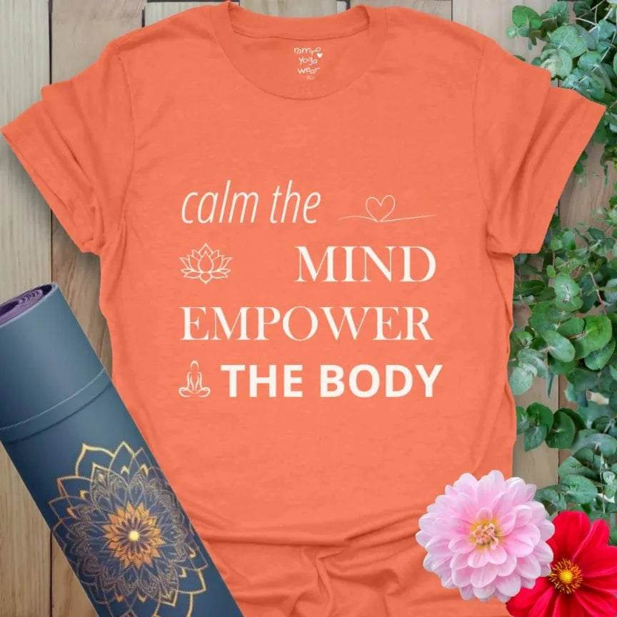 Heather Orange Empower T-Shirt featuring the mantra “Calm the Mind, Empower the Body.” Soft yoga lifestyle shirt for mindfulness and strength.