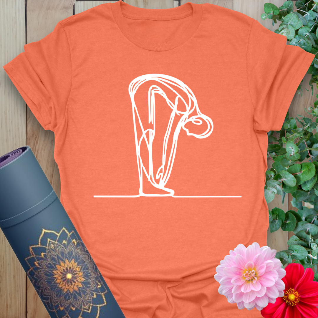 Vibrant orange yoga t-shirt showcasing serene forward bend yoga pose illustration for soulful, conscious living.
