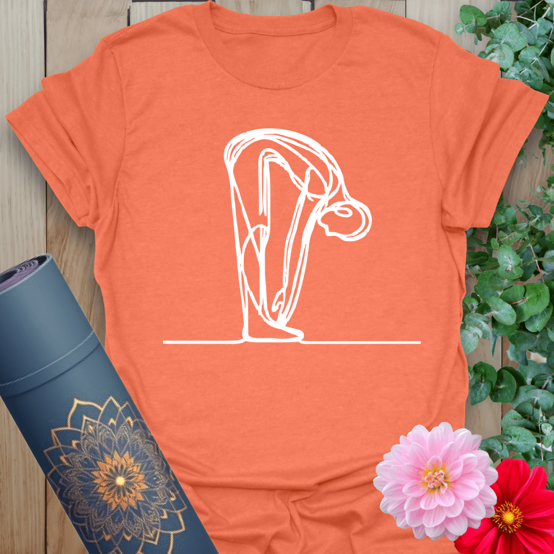 Vibrant orange yoga t-shirt showcasing serene forward bend yoga pose illustration for soulful, conscious living.