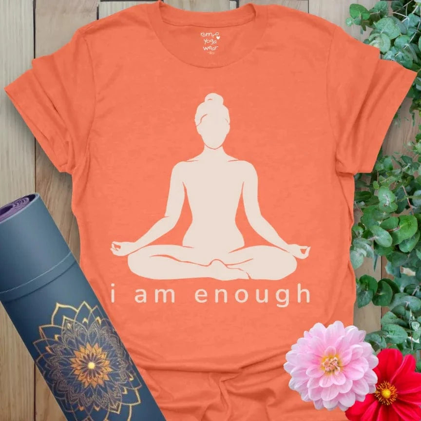 Heather Orange I Am Enough T-Shirt featuring minimalist yogi illustration with mantra “I Am Enough.” Vibrant yoga gift shirt for empowerment.