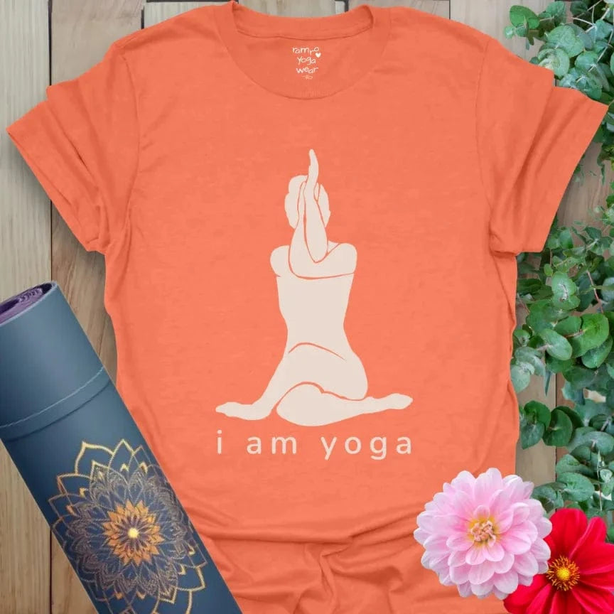 Heather Orange I Am Yoga T-Shirt featuring bold yogi graphic and mantra “I Am Yoga.” Vibrant yoga gift shirt for grounding and strength.